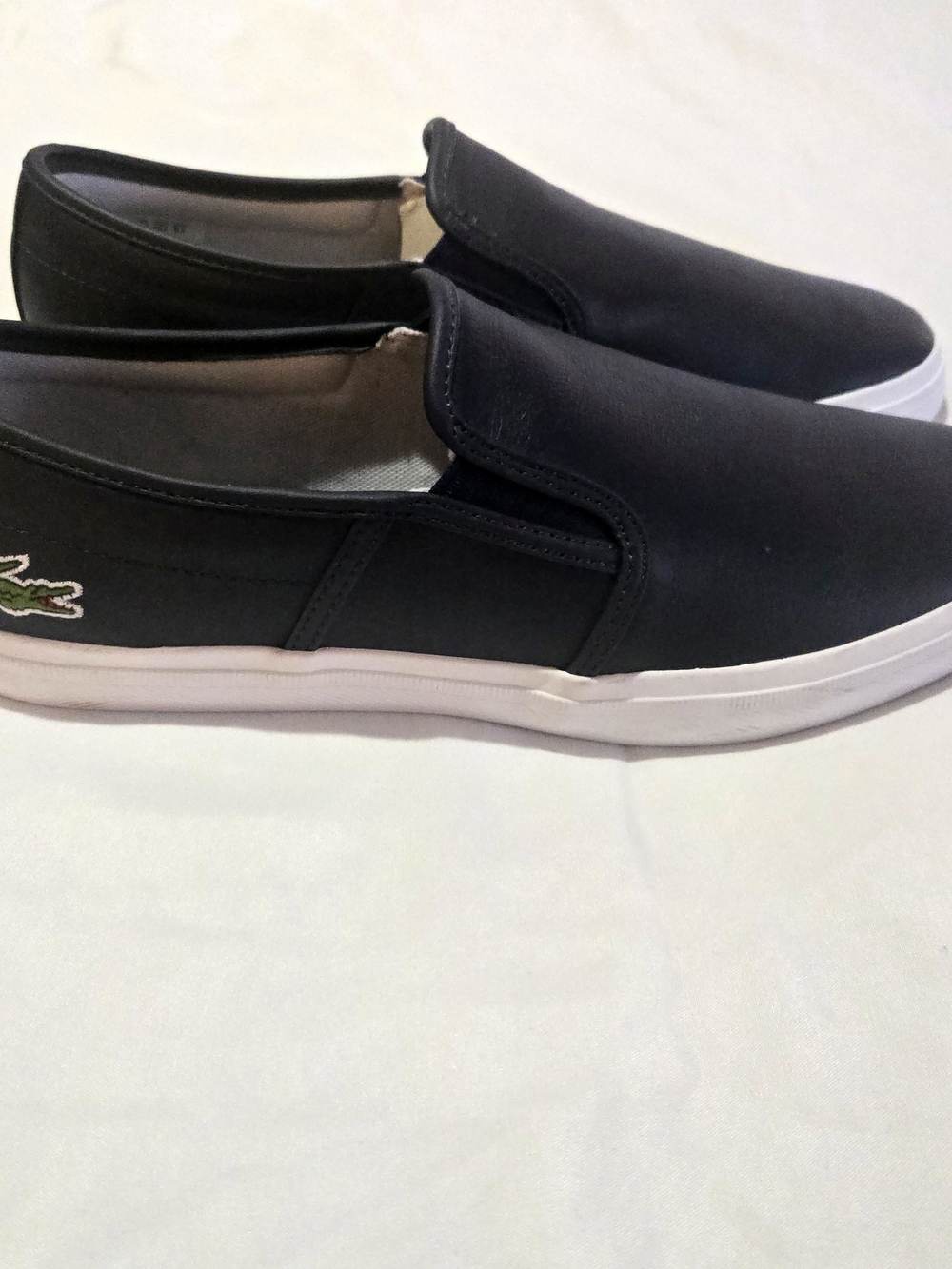 Lacoste Men's Black Slip-On Canvas Loafers with White Sole